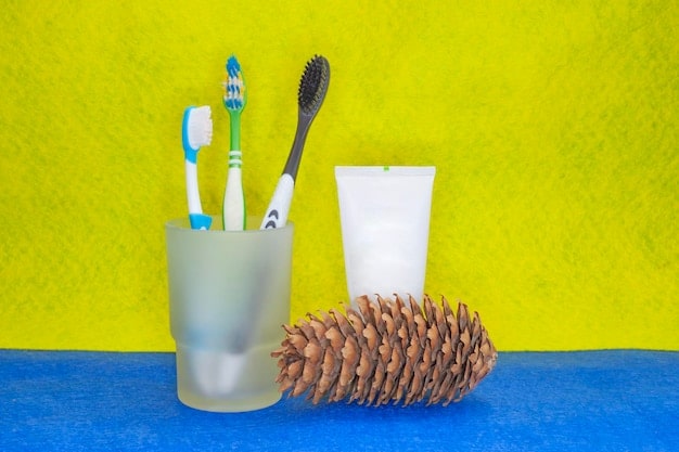 A small, brightly colored travel kit containing essential toiletries like a toothbrush, toothpaste, shampoo, and soap. The kit is placed on a hotel bathroom counter, suggesting preparedness for travel disruptions.