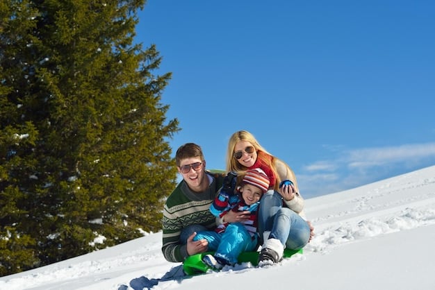 A family smiles while skiing down a snow-covered slope in Aspen, Colorado. The children are dressed warmly in colorful snowsuits, and the parents are skiing alongside them, offering guidance and support. In the background, snow-capped mountains rise majestically, emphasizing the stunning winter landscape of Aspen.