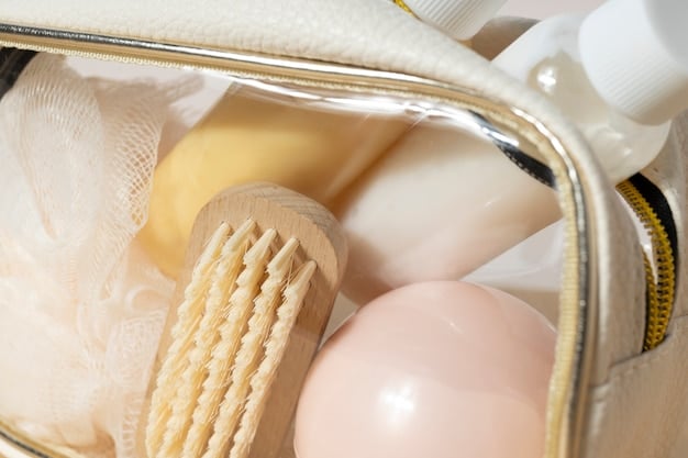 A close-up of a clear travel toiletry bag filled with small, labeled bottles of shampoo, conditioner, sunscreen, and other personal care items, ready for travel.